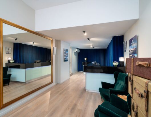 Reception Area with Chairs and Mirror